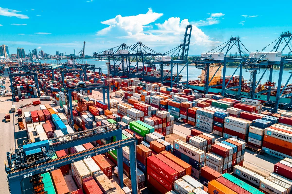 Shipping containers at a port representing the scheduled CAPE Phase 3 filing date