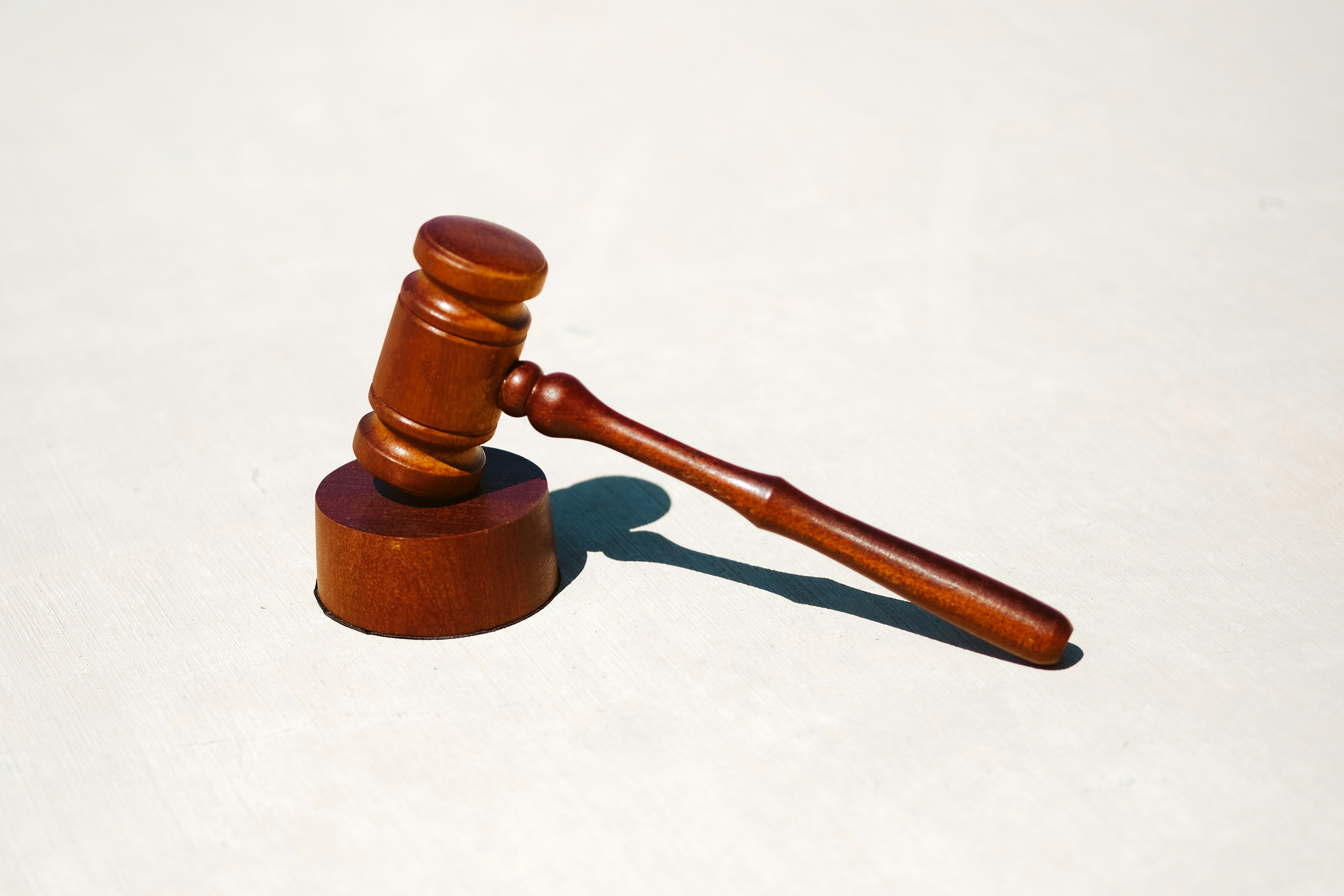 Courthouse gavel and order document representing the CIT reliquidation order for finally liquidated IEEPA entries